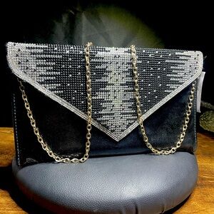 Elegant Black and Silver Clutch with Gold Chain